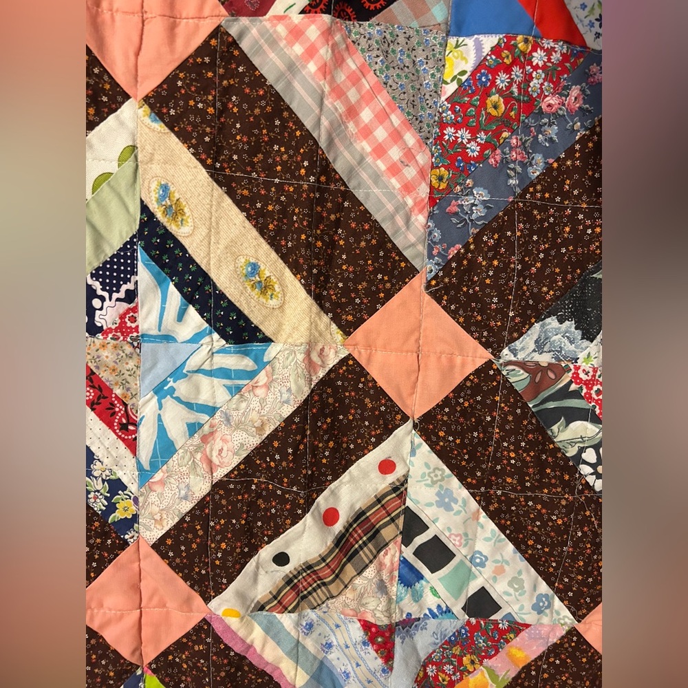 Gorgeous patterned quilt.